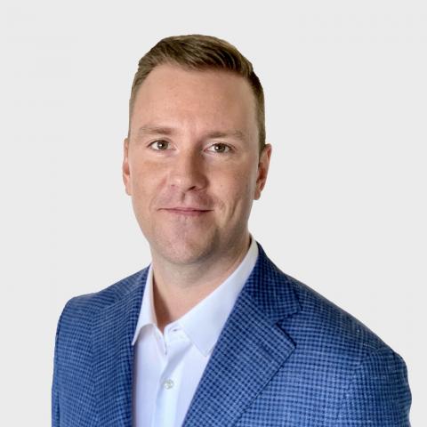 Head shot of Mark Thompson, looking into camera